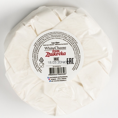 Сыр Бри White Cheese From Zhukovka 60% в бумажной упаковке